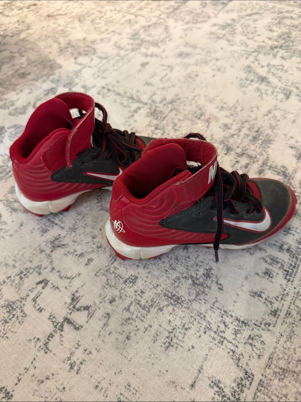 Nike Kids Red and Black High-Top baseball shoes